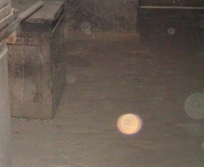 Orbs, yellow-orange coloured in motion